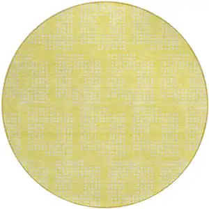 Photo of 8' Yellow And Ivory Round Geometric Washable Indoor Outdoor Area Rug