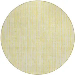Photo of 8' Yellow And Ivory Round Striped Washable Indoor Outdoor Area Rug