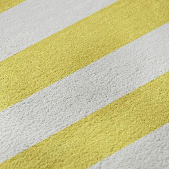 8' Yellow And Ivory Striped Washable Round Rug With UV Protection Photo 9