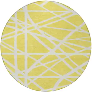 Photo of 8' Yellow And Linen Round Geometric Washable Indoor Outdoor Area Rug