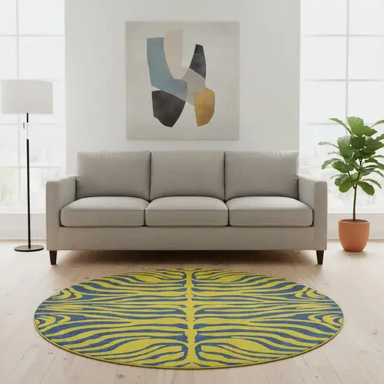 8' Yellow And Navy Blue Animal Print Washable Round Rug With UV Protection Photo 2