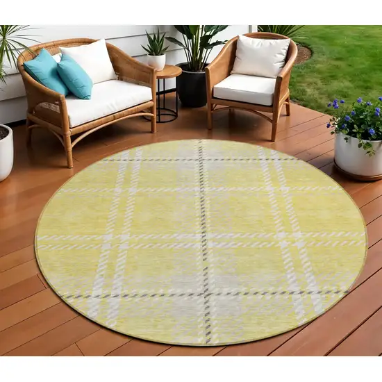 8' Yellow Black And Ivory Round Plaid Washable Indoor Outdoor Area Rug Photo 1