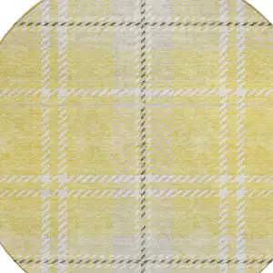 Photo of 8' Yellow Black And Ivory Round Plaid Washable Indoor Outdoor Area Rug
