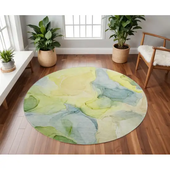8' Yellow Blue And Beige Abstract Washable Round Rug With UV Protection Photo 2