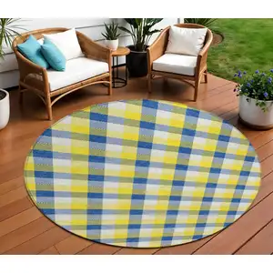 Photo of 8' Yellow Blue And Beige Round Plaid Washable Indoor Outdoor Area Rug