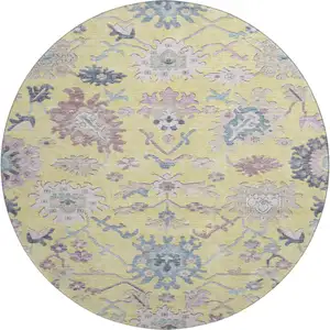 Photo of 8' Yellow Blue And Blush Floral Washable Round Rug With UV Protection