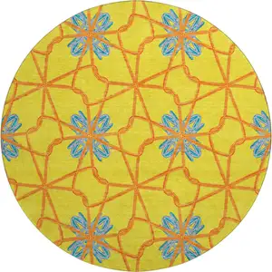 Photo of 8' Yellow Blue And Red Geometric Washable Round Rug With UV Protection