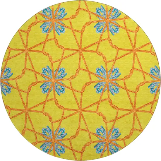 8' Yellow Blue And Red Geometric Washable Round Rug With UV Protection Photo 1