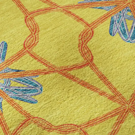 8' Yellow Blue And Red Geometric Washable Round Rug With UV Protection Photo 8