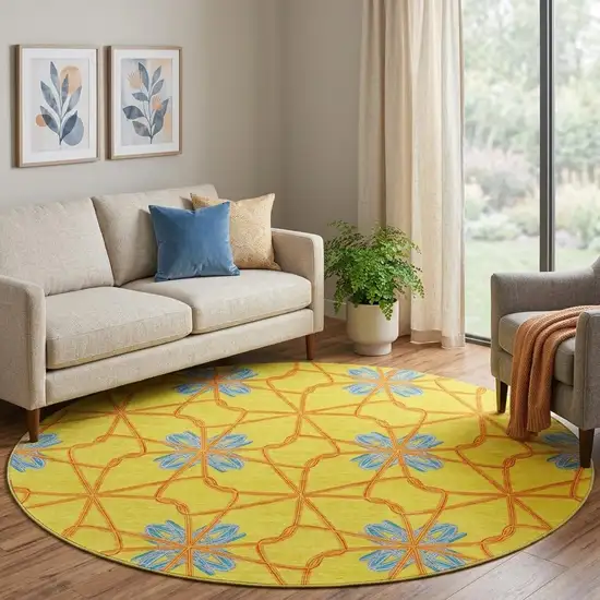 8' Yellow Blue And Red Geometric Washable Round Rug With UV Protection Photo 1