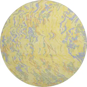 Photo of 8' Yellow Copper And Blue Abstract Washable Round Rug With UV Protection