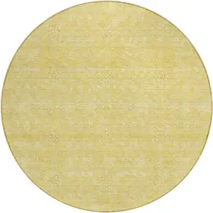 Photo of 8' Yellow Gold And Ivory Round Floral Washable Indoor Outdoor Area Rug