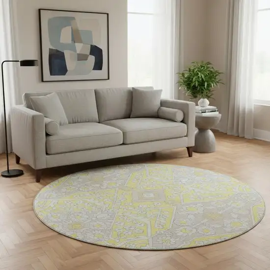 8' Yellow Ivory And Beige Floral Washable Round Rug With UV Protection Photo 1