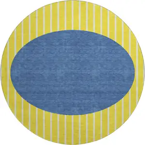 Photo of 8' Yellow Ivory And Blue Striped Washable Round Rug With UV Protection