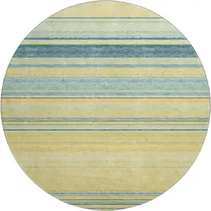 Photo of 8' Yellow Ivory And Wheat Striped Washable Round Rug With UV Protection