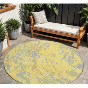 Photo of 8' Yellow Purple And Green Round Abstract Washable Indoor Outdoor Area Rug