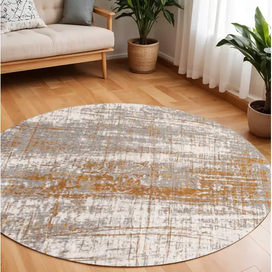 8' Yellow and Brown Round Abstract Non Skid Area Rug Photo 1