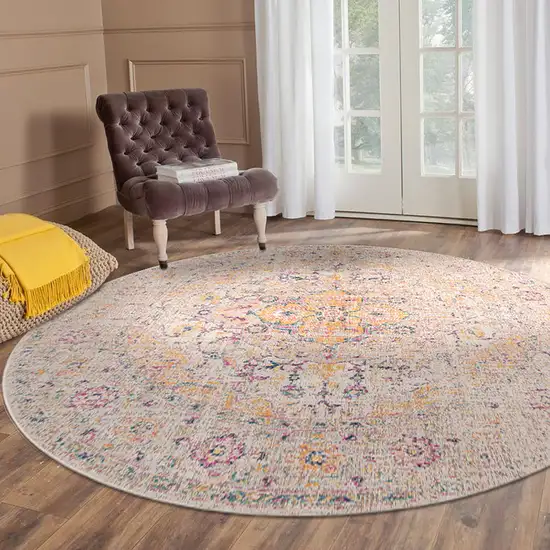 6' Yellow and Ivory Round Oriental Power Loom Distressed Area Rug Photo 6