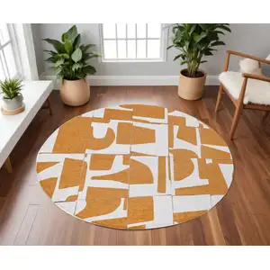 Photo of 8' Yellow and White Round Geometric Non Skid Area Rug