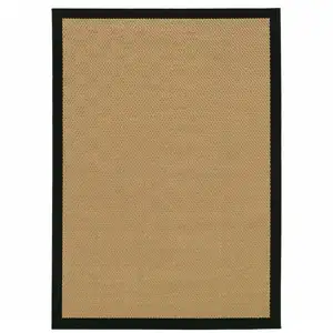 Photo of 2'x4' Beige and Black Plain Indoor Outdoor Scatter Rug