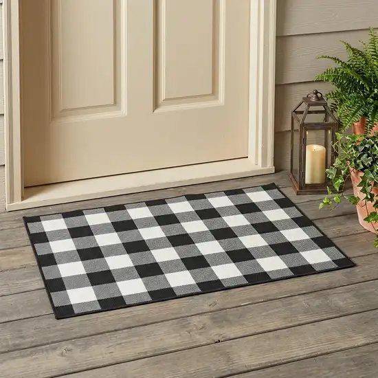 Black And Ivory Indoor Outdoor Area Rug Photo 1