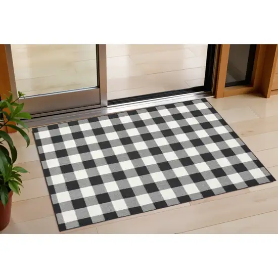 Black And Ivory Indoor Outdoor Area Rug Photo 1
