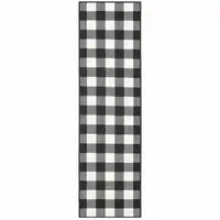 Photo of 2'x8' Black and Ivory Gingham Indoor Outdoor Runner Rug
