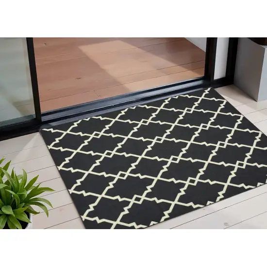 Black And Ivory Indoor Outdoor Area Rug Photo 1
