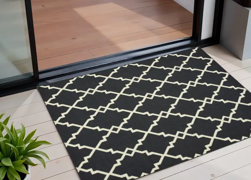 Black And Ivory Indoor Outdoor Area Rug Photo 1