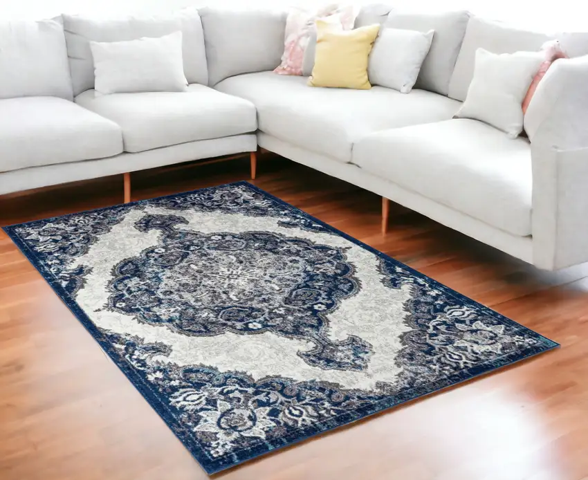 5' x 7' Blue and Gray Medallion Power Loom Area Rug Photo 1
