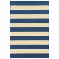 Photo of 2'x4' Blue and Ivory Striped Indoor Outdoor Scatter Rug