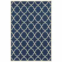 Photo of 2'x4' Blue and Ivory Trellis Indoor Outdoor Scatter Rug