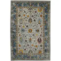 Photo of 5' x 7' Blue and Orange Floral Power Loom Area Rug