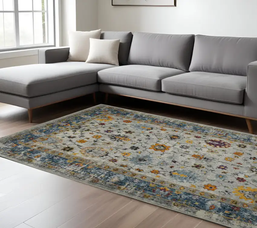 Blue and Orange Floral Power Loom Area Rug Photo 1