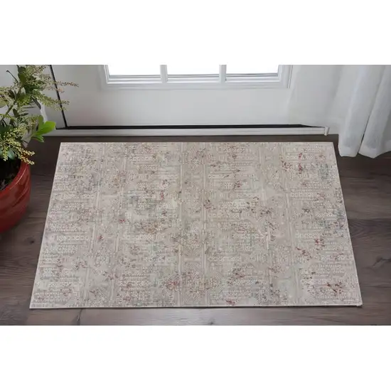 Gray And Ivory Geometric Distressed Stain Resistant Area Rug Photo 1