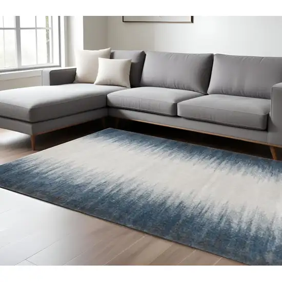 Ivory And Blue Abstract Area Rug Photo 1