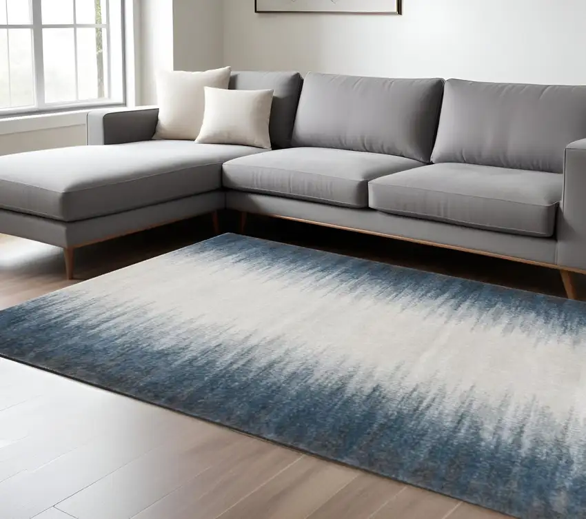 Ivory And Blue Abstract Area Rug Photo 1