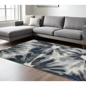 Photo of 8'x11' Ivory Blue Machine Woven Oversized Floral Indoor Area Rug