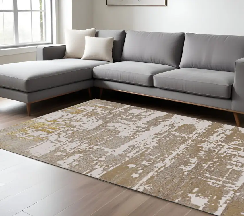 Ivory Taupe And Gold Abstract Area Rug Photo 2
