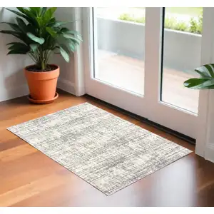 Photo of 2'x3' Ivory and Gray Abstract Strokes Scatter Rug