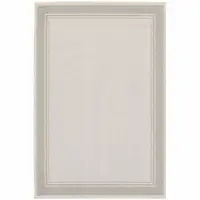 Photo of 5'x7' Ivory and Gray Bordered Indoor Outdoor Area Rug