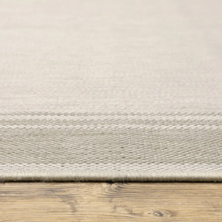 8'x10' Ivory and Gray Bordered Indoor Outdoor Area Rug Photo 4