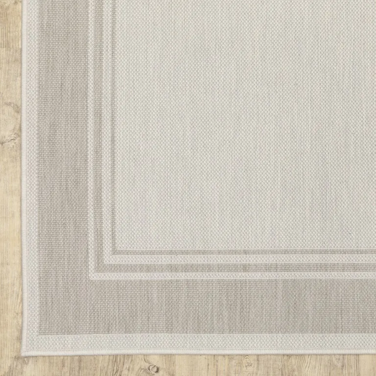 8'x10' Ivory and Gray Bordered Indoor Outdoor Area Rug Photo 2
