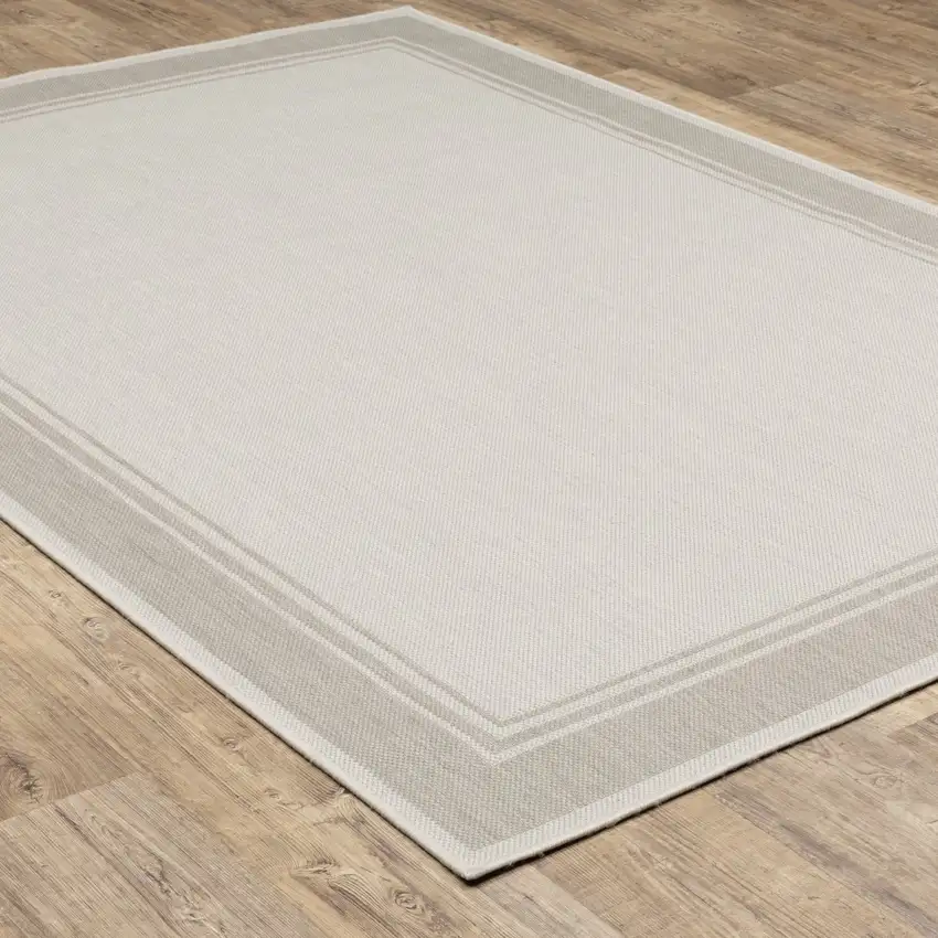 8'x10' Ivory and Gray Bordered Indoor Outdoor Area Rug Photo 8