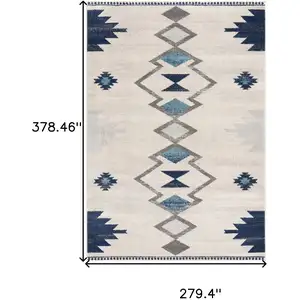 Photo of 9' x 13' Navy and Ivory Tribal Pattern Area Rug