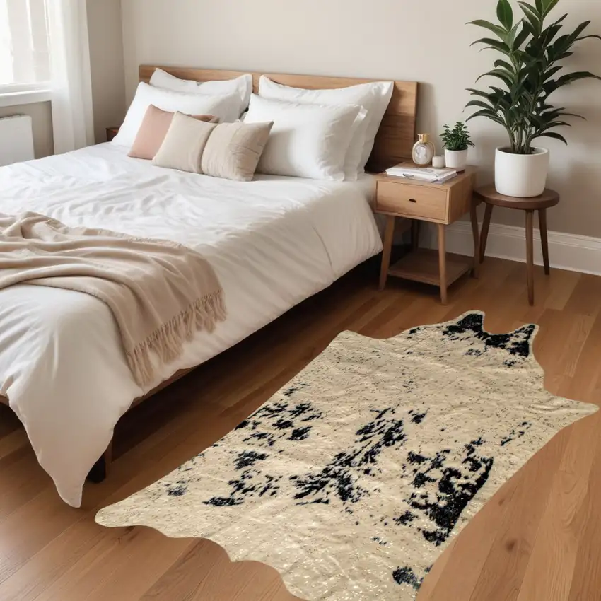 4'x 5' Off White Black And Gold Faux Cowhide Non Skid Area Rug Photo 1