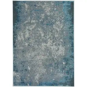 Photo of 8'x11' Silver Blue Machine Woven Abstract Smudge Indoor Area Rug