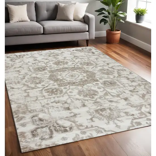 Cream Gray And Light Brown Medallion Area Rug Photo 1
