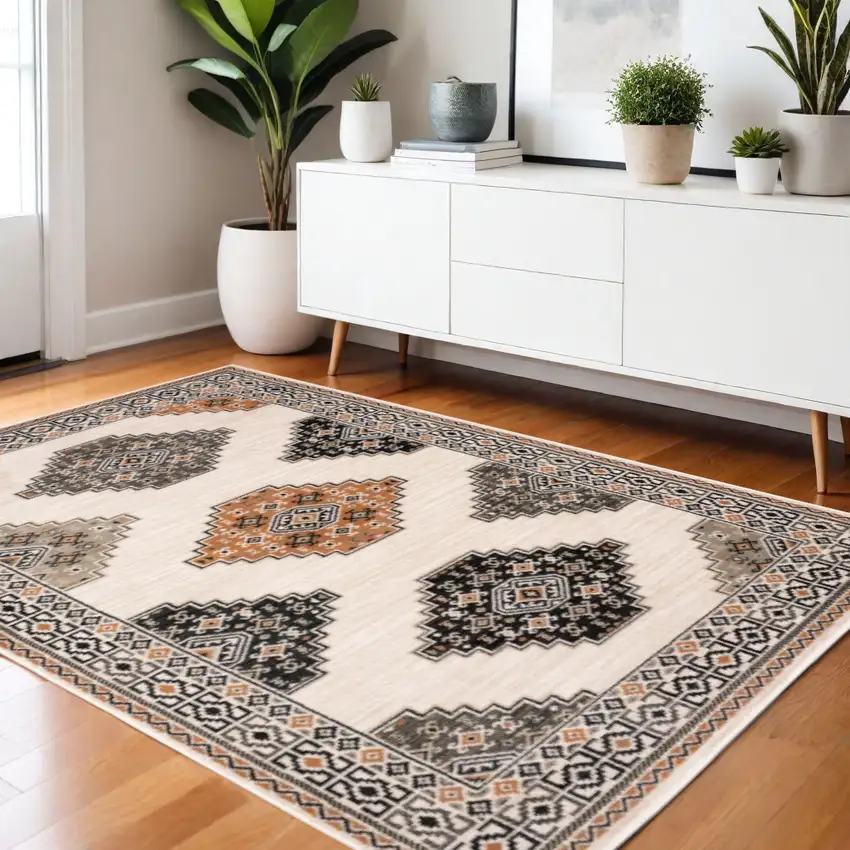 Ivory Black Orange And Gray Geometric Area Rug Photo 1