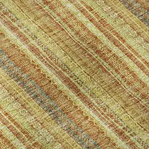 Photo of Amber And Artichoke Green Striped Washable Area Rug With UV Protection